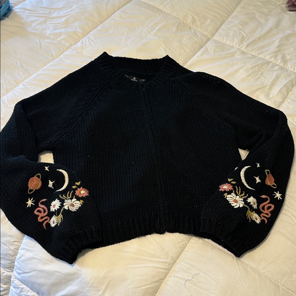 Volcom - Like NEW Black Textured Knit Sweater with crocheted flowers on sleeve.